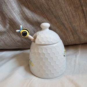 Honey jar with bees